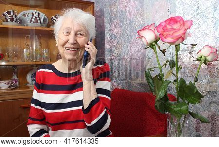 Senior Woman Talking On Phone Indoor
