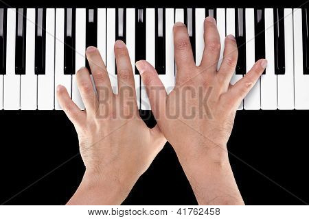 Hands On A Piano Keyboard