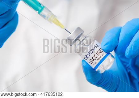 Abbvie Vaccine Against Coronavirus Collected Into The Syringe By Health Worker Or Doctor In Protecti