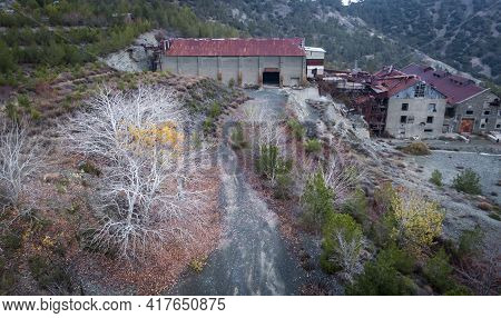 Abandoned Factory Buildings Of Former Asbestos Mine And Colorful Autumn Landscape Of Amiantos, Cypru
