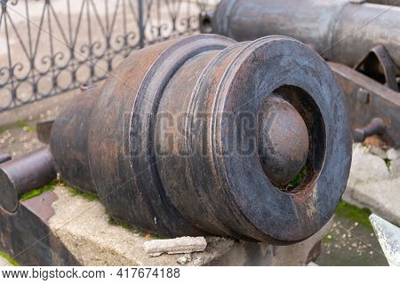 An Old Ship's Cannon. Mounted Howitzer. The Core In The Barrel Of The Gun.