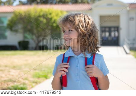 Little Boy On His First Day At American School. Concept Of Primary School Education.