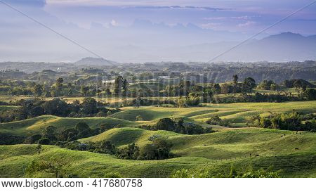 Panoramic View Of The Valley And Hills Of Filandia At The Golden Hour Of Sunset