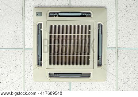 Indoor Unit Of Cassette Air Conditioner Located On False Ceiling In The Office Building