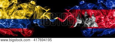 Colombia, Colombian Vs Cambodia, Cambodian, Khmer Smoky Mystic Flags Placed Side By Side. Thick Colo