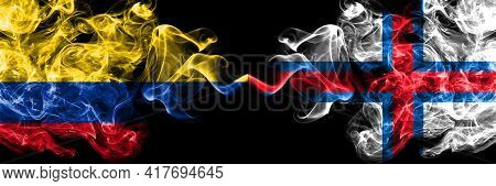 Colombia, Colombian Vs Faroe Islands, Faroese Smoky Mystic Flags Placed Side By Side. Thick Colored 