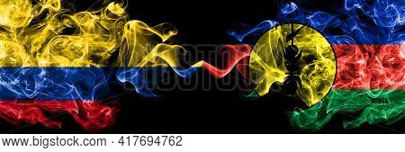 Colombia, Colombian Vs France, French, Flnks Smoky Mystic Flags Placed Side By Side. Thick Colored S