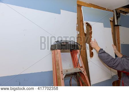 Kitchen Renovation In Progress With Removed Old Sheetrock Preparing For New Cabinet Installation In 