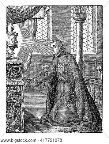 Stanislaus Kostka, a Polish Jesuit, canonized in 1726. Saint Stanislaus is kneeling in front of an altar on which a radiant chalice.