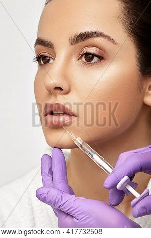 Sensual Female Lips, Procedure Lip Augmentation. Syringe Near Womans Mouth, Injections For Increase 