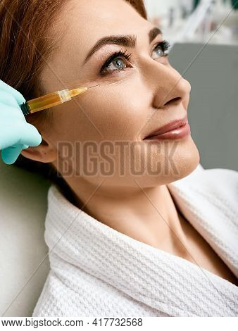 Adult Woman While Face Plasmolifting At A Beauty Clinic. Cosmetology Procedure For Anti-aging Effect