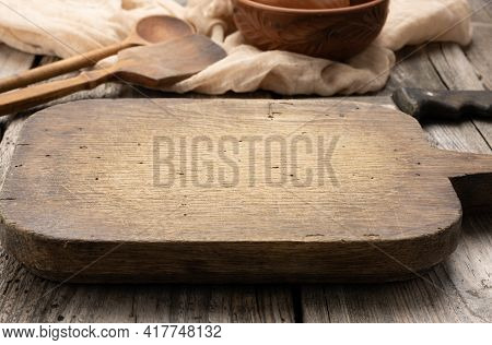 Very Okd Empty Rectangular Wooden Cutting Kitchen Board On Table, Top View