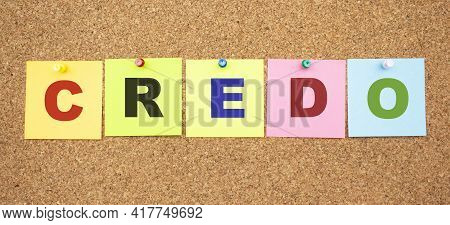 Word Credo. Color Notes With Letters Pinned On A Board. Work Space.