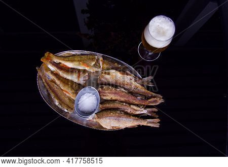 Tasty Baked Fish On Plate Flat Lay On Dark Background