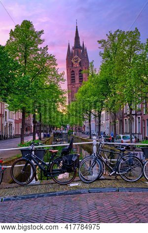Delt street with bicycles on bridge over canal
