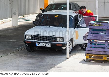 Alanya, Turkey - April 12 2021: White Tofas Murat 124 Is Parked  On The Street On A Warm Summer Day 