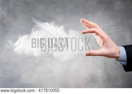 Businessman Holds The Inscription Big Data. Padlock , Brain ,man, Planet,graph, Magnifier, Gears, Cl