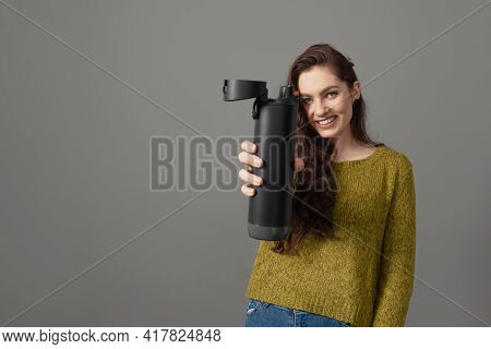 Woman Holding Eco Reusable Smart Thermo Water Bottle With Drink Reminder, Healthy Lifestyle Concept