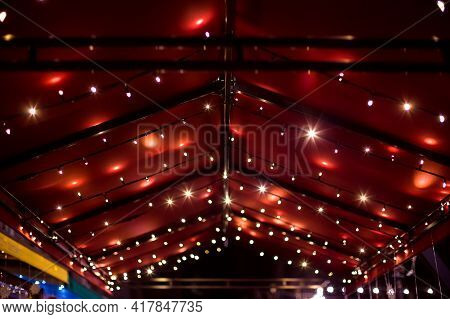 Top Of The Canopy In A Red Textile Gazebo With String Light Garlands Decorative Holiday Lighting Roo