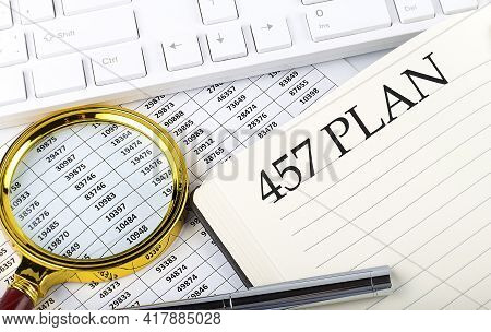 457 Plan Text On The Notebook With Chart, Magnifier,keyboard And Pen