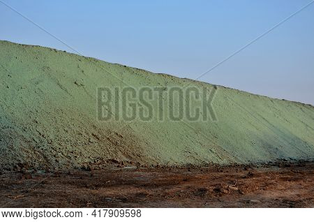 Stabilization Of Slopes By Hydro Sowing. A Mixture Of Wood Pulp And Green Grass Seed Is Sprayed From