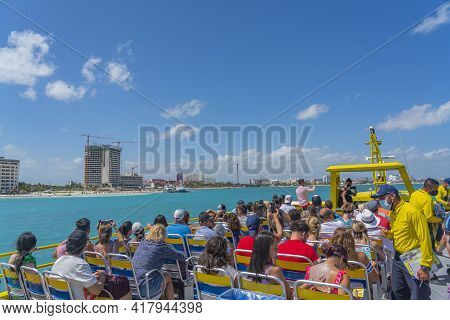 Cancun, Mexiico - March 10.2021: Ultramar Ferry Leaving To Isla Mujeres, View From The Boots Deck To
