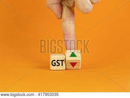 Gst, Goods And Services Tax Symbol. Businessman Turns A Cube With Up And Down Icon. Word 'gst'. Beau