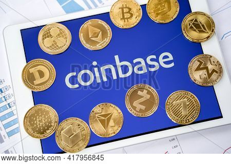 Russia Moscow 29.03.2021 Tablet With Logo Of Cryptocurrency Exchange Coinbase. Crypto Coins Company,