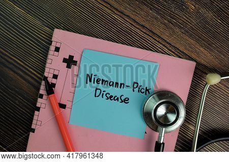 Niemann-pick Disease Write On Sticky Notes Isolated On Wooden Table.