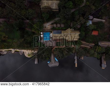 Aerial Panorama View Of Amazon Tropical Rainforest Exotic Lush Jungle Eco Lodge Hotel Wooden Cabin S