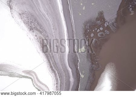 Beige And White Marble Texture. Liqued Ink Background.