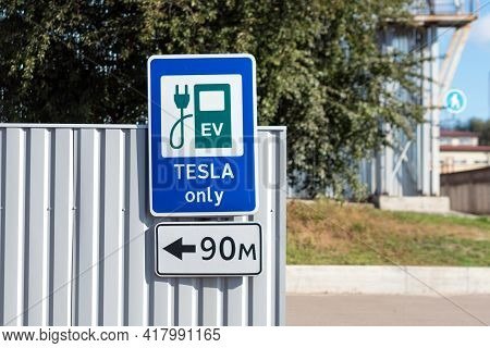 Kyiv, Ukraine - October 17, 2020: Tesla Vehicle Charging Only Sign Near The Charging Station Against