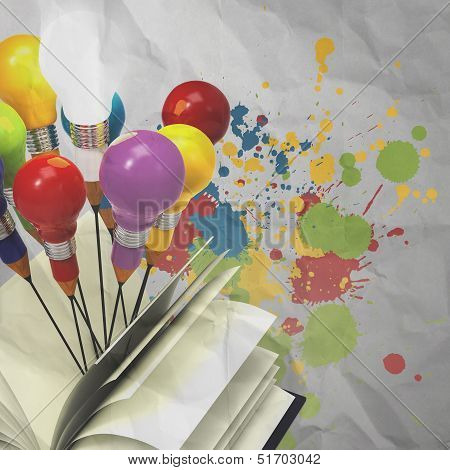 Drawing Idea Pencil And Light Bulb Concept Outside The Book With Splash Colors