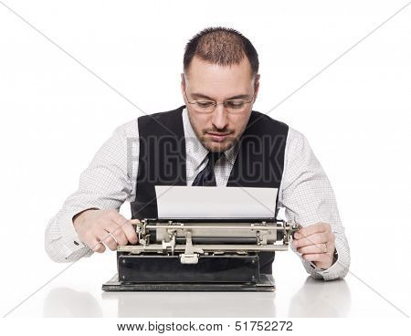 Man writing on a vintage typewriter
