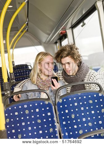 Young couple alone on the bus