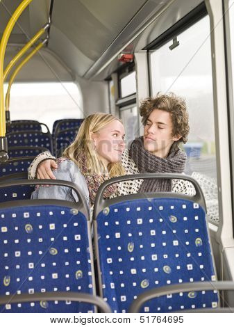Young couple alone on the bus