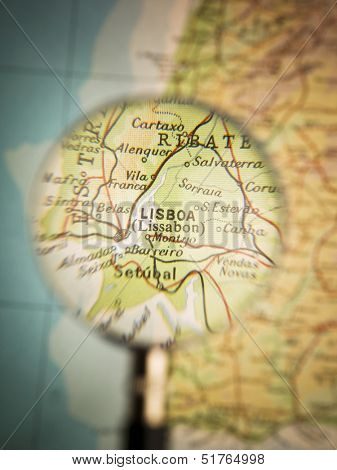 Magnifying Glass in front of a Lisboa map