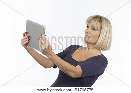 Senior Woman Using A Tablet Computer