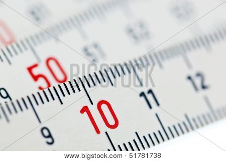 a white ruler of a carpenter is isolated on a white background.