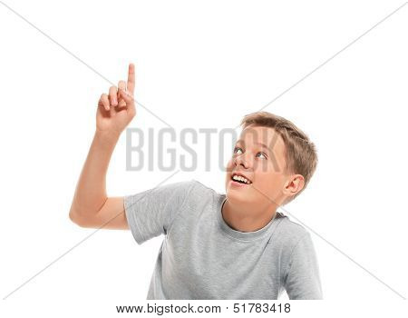 Teenage boy points up