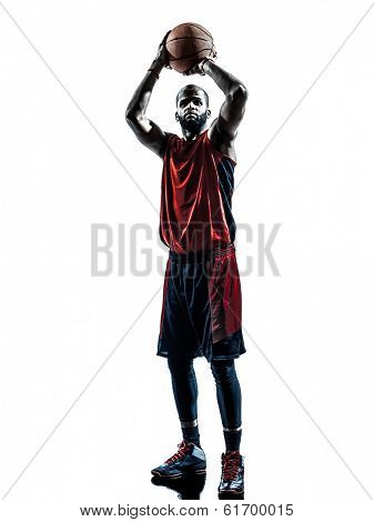 one african man basketball player free throw in silhouette isolated white background