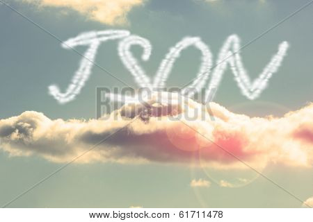 The word json against bright blue sky with cloud