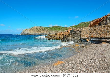 Blue Water And Rocks