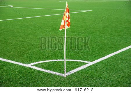 A Flag At One Corner Of  Football Stadium