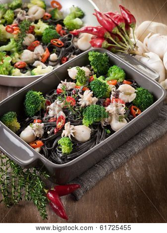 ink squid tagliatelle with sepia and broccoli
