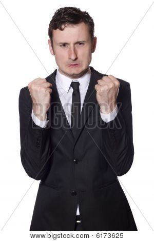 Angry Businessman Is Showing His Fists