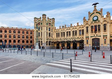 VALENCIA, SPAIN - JANUARY 14, 2014: City plaza and North Station - main railway station in Valencia, Spain, located in city center, opened in 1917 and declared Good of Cultural Heritage in 1987.