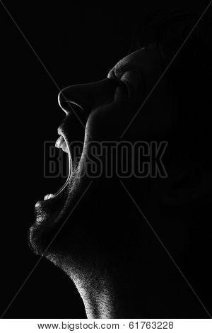 man crying out