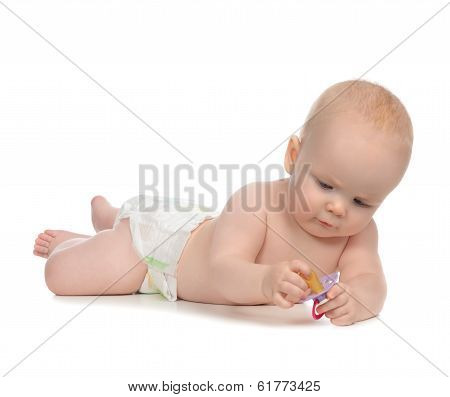 6 Month Child Girl Lying Happy Holding Baby Nipple Soother