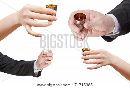 Set Of Hands With Glass Of Spirits